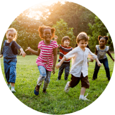 group-diverse-kids-playing-field-together-e1625228976288.png